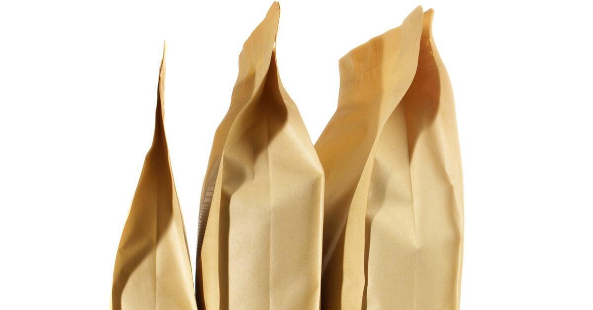 The side of three sealed and gusseted bags against a white background. The bags have different heights and widths.